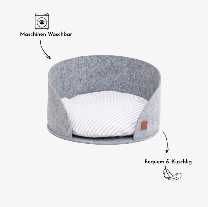 Lit pour animaux en feutre gris clair avec bords incurvés et coussin rayé